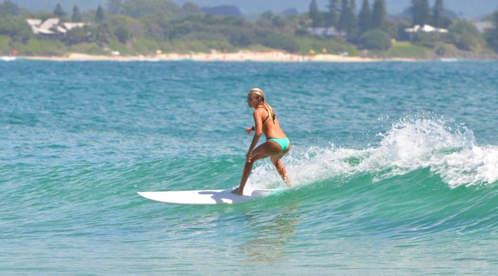 Lucy_Surfing_At_The_Pass_Byron_Palms_Guest_House.jpg